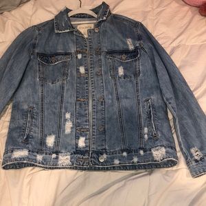 Light wash distressed denim jacket